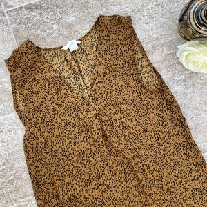 Previously loved cheetah print blouse